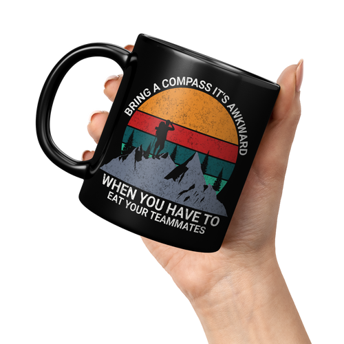 Bring_a_Compass_Its_Awkward_When_You_Ha_11oz_Black_LH_Model_Mockup.png