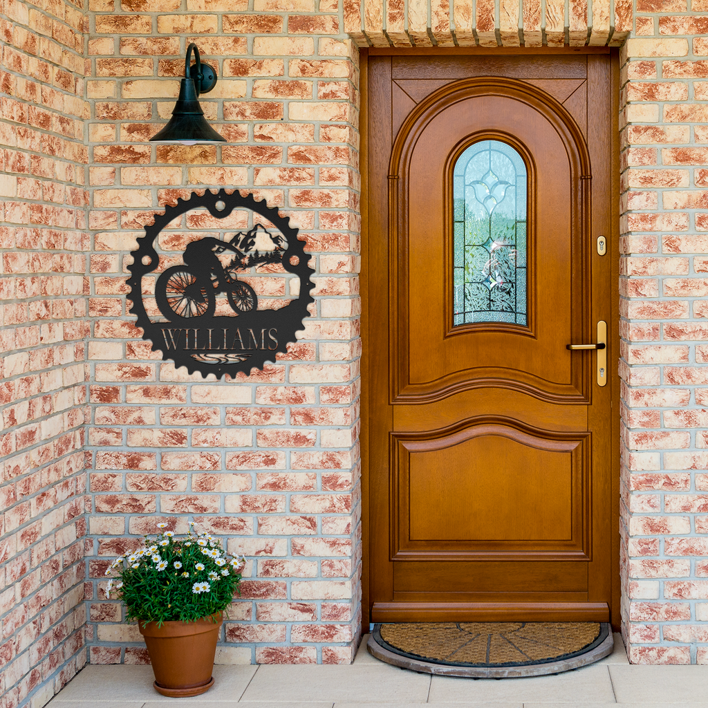 Personalized_Mountain_Biker_Chainring_Me_Black_Brick_Entrance_Mockup.png
